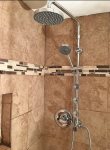 Full body shower with adjustable nozzles